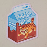 A chocolate milk carton with a cute angry tiger on it.